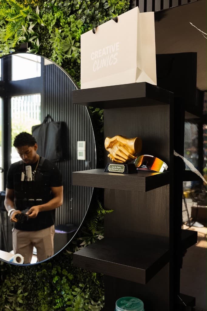 Jog the Barber — trofee en shop in de Amsterdamse winkel
